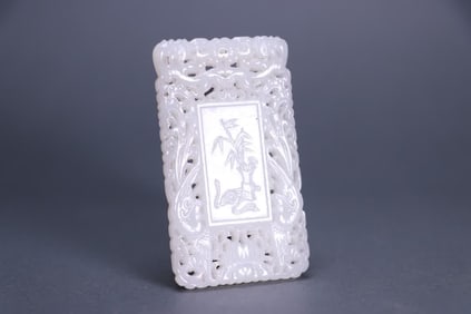 A jade plaque with Hetian jade hollow character stories