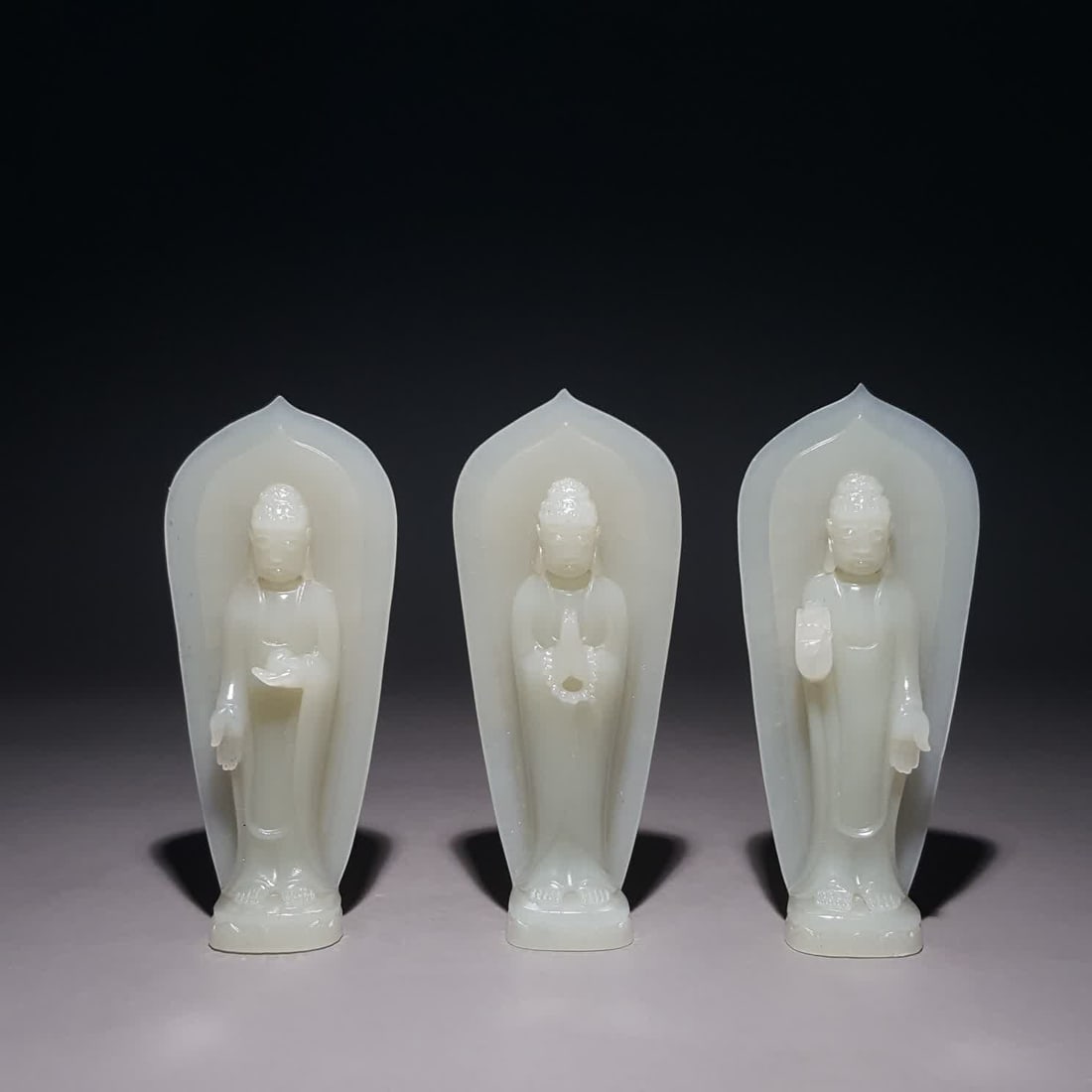 A set of Qing Dynasty Hetian jade three saint Buddha sculptures "Universal Virtue Wishes" (1 of 9)