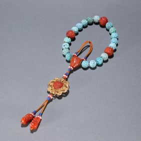 A piece of Qing Dynasty turquoise carving Tuan Shouwen eighteen sons held