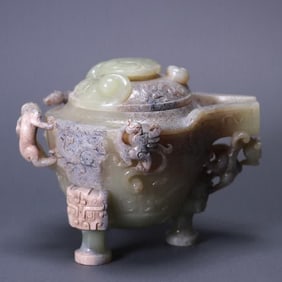 An ancient jade dragon pattern wine vessel