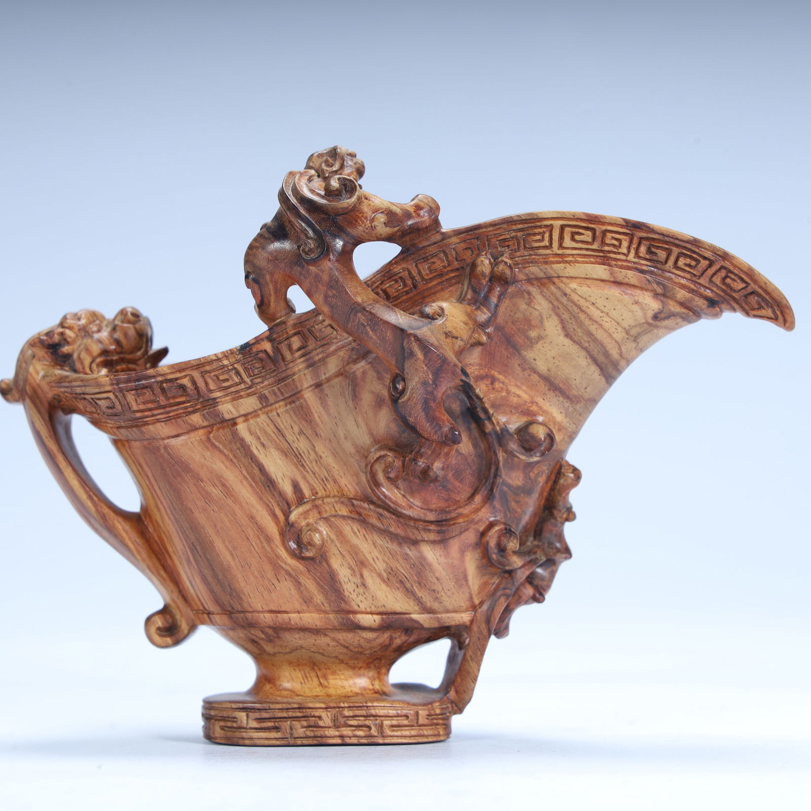 A Qing Dynasty Huanghuali wood carved dragon pattern cup: Qing Dynasty Huanghuali wood carved dragon pattern cup SIZE: H:9cm L:11.5cm W:5.5cm W:60g (The Dimensions Of All Batches Are Manually Measured.If You Need More Detailed Information, Please Contact Our