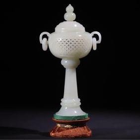 A Qing Dynasty blue and white jade candle stand-style hollow smoker