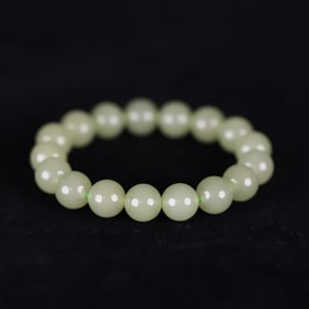 A Qing Dynasty Hetian topaz bead bracelet