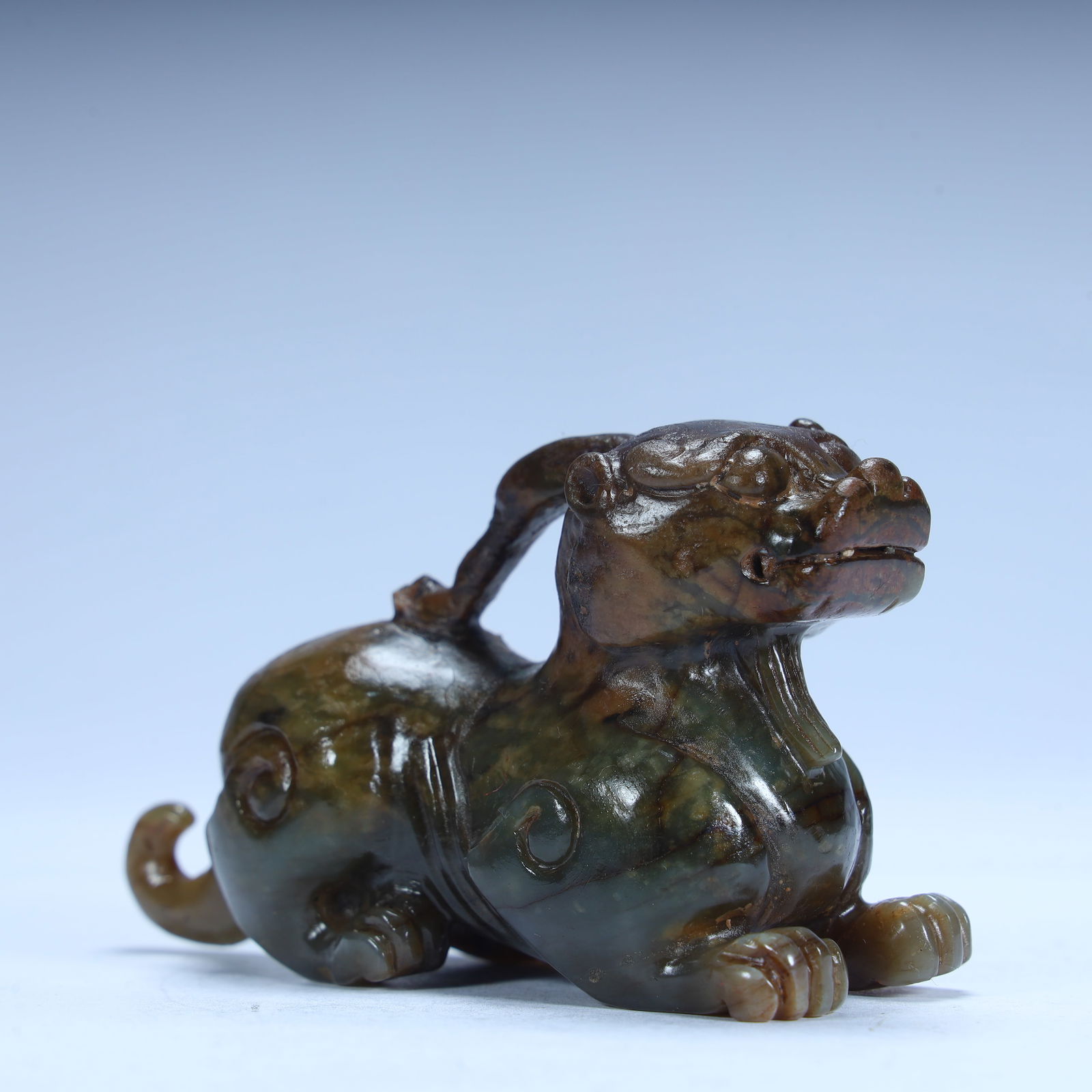 A Han Dynasty green jade ornament to ward off evil beasts (1 of 10)