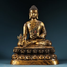 A high-relief clay gold Tibetan Medicine Buddha Buddha statue