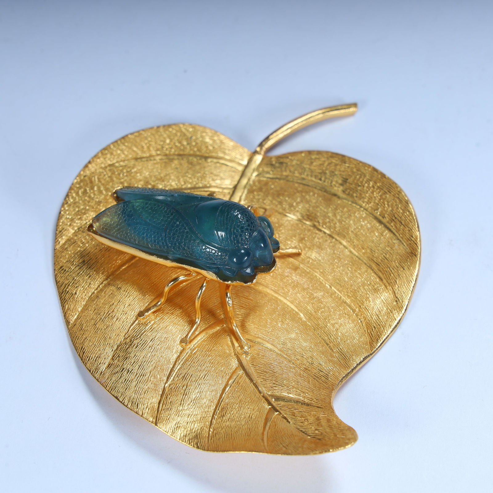 A gold-inlaid jade cicada leaf ornament (1 of 6)