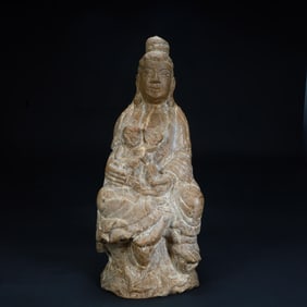 A stone carving statue of Guanyin
