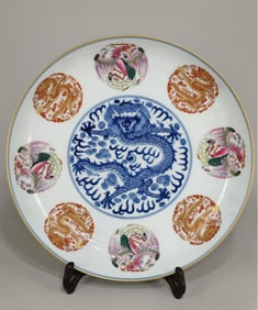 A Qing Yongzheng blue and white bucket pastel dragon and phoenix plate