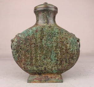 A Han Dynasty bronze inscription flat pot