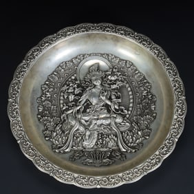 A Qing Dynasty gilt silver green Tara offering