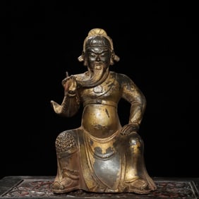 A bronze gold statue of Guan Gong Buddha