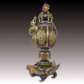 A cloisonné enamel gilt turtle palace lamp from the Qing Dynasty