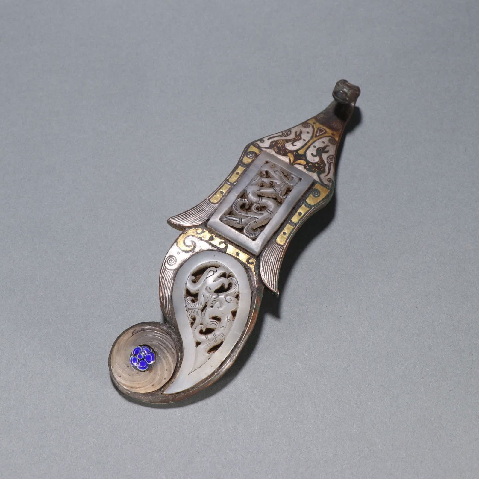 A Han Dynasty copper gold and silver inlaid jade dragon pattern belt hook (1 of 9)