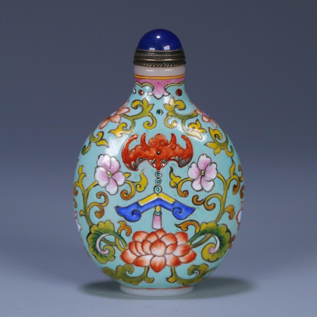 A Qing Dynasty material vessel enamel color snuff bottle (1 of 9)