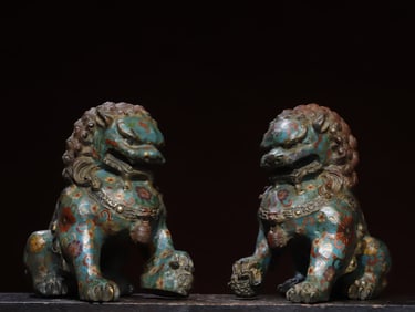 A pair of cloisonné cloisonné enamel lion ornaments
