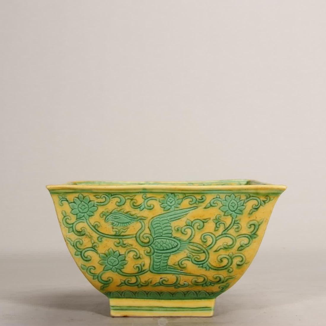 A Ming Jiajing yellow ground green phoenix pattern bowl (1 of 10)