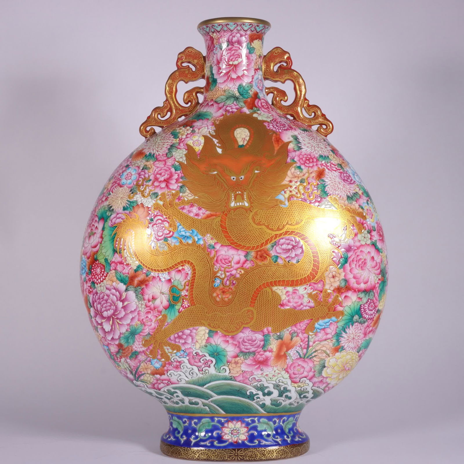 A Qing Qianlong pastel dragon wearing a kaleidoscope of flowers and holding the moon bottle (1 of 9)