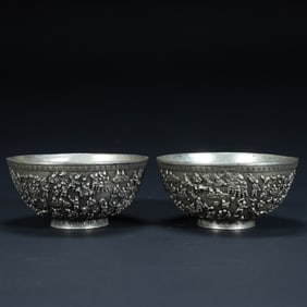 A Qing Dynasty silver "Baizi Tu" patterned bowl