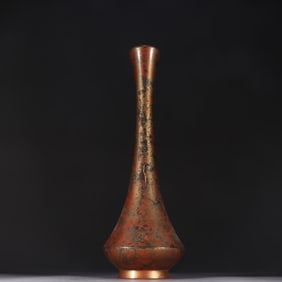 A copper-gilt longneck bottle