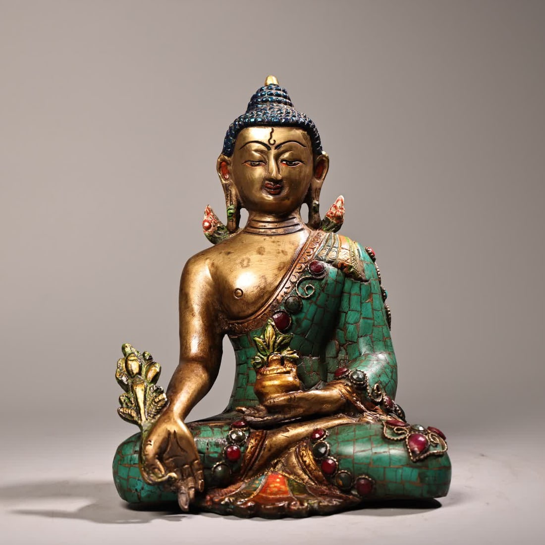 A painted statue of the Tibetan Tantric Medicine Buddha in gold painting (1 of 10)