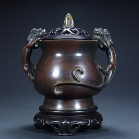 A Ming Dynasty Xuande copper tire double dragon ear aroma diffuser
