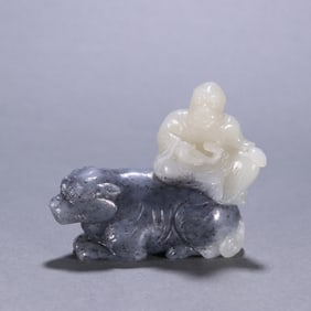 A Qing Dynasty blue and white seed material Fuhu Luohan Dynasty carving