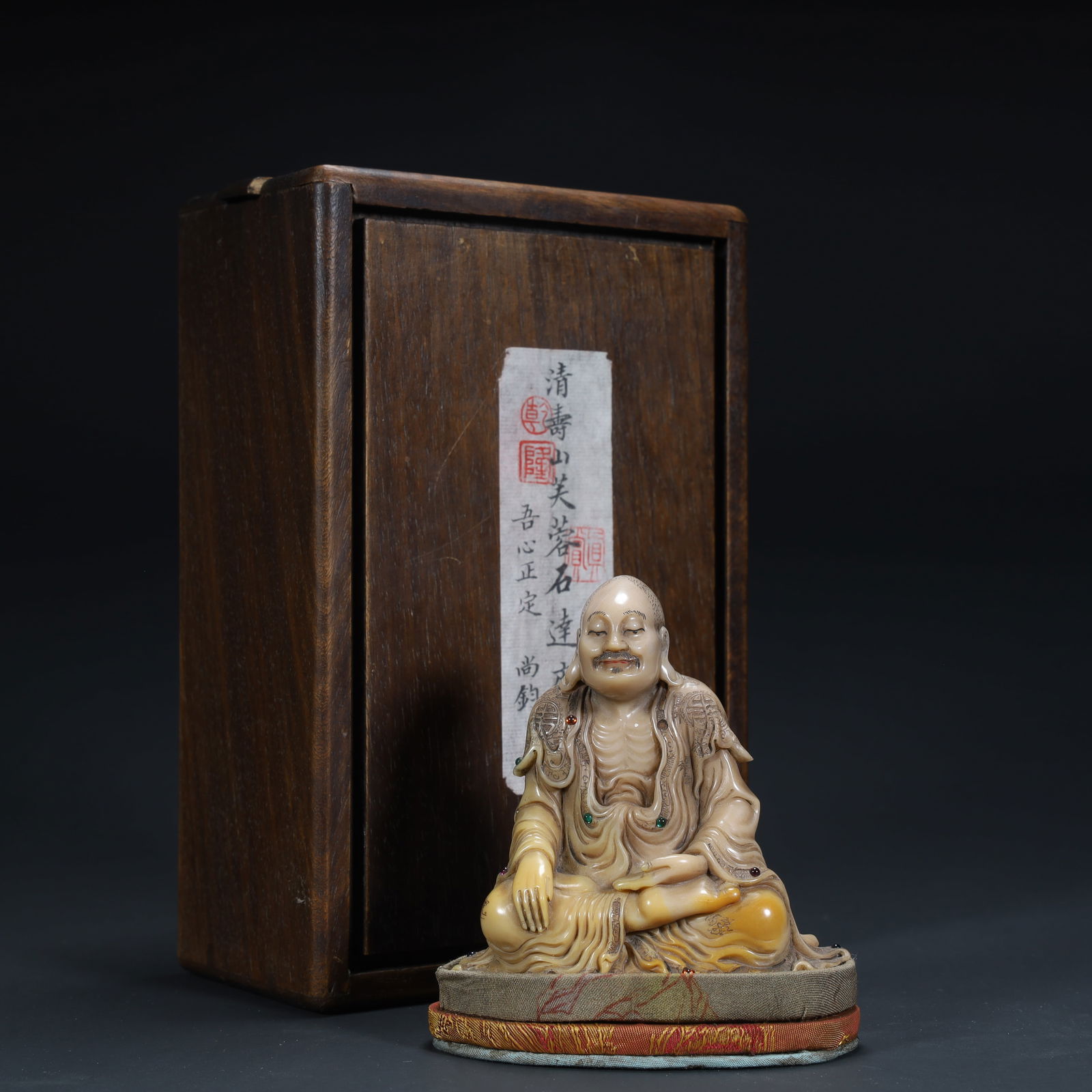 A seated statue of a stone carved Arhat in Shoushan in the Qing Dynasty (1 of 9)