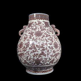 A glazed red entwined lotus eight treasures of the Great Fuku Tube Zun