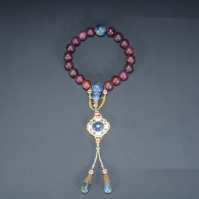 A piece of Qing Dynasty amethyst with lapis lazuli morning beads