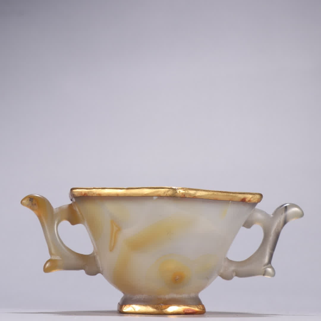 A piece of Liao gold agate gold-filled amphora: Liao Jin Agate Gold-Filled Amphora SIZE: H:5.2cm W:12.4cm W:138.5g (The Dimensions Of All Batches Are Manually Measured.If You Need More Detailed Information, Please Contact Our Customer Service Befor