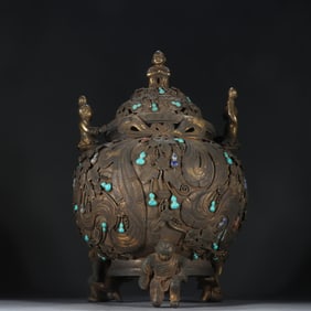 A copper gilt boy aroma burner