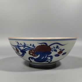 A red bowl with blue and white glaze in the Qing Dynasty