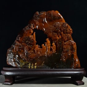 A Shoushan stone crow skin field yellow stone hollow carved ornament