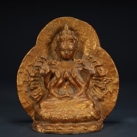 A clay sculpture gilt statue of Guanyin with a thousand hands