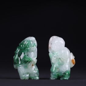 A pair of jade "boys holding Ganoderma lucidum" handles