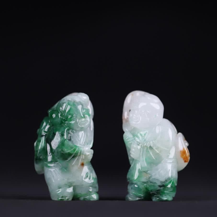 A pair of jade "boys holding Ganoderma lucidum" handles (1 of 9)