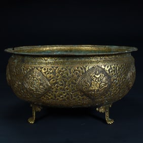 A Qing Dynasty Tibetan copper gilt water purification bowl
