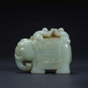 A Qing Dynasty Hetian jade "Boy Drama" ornament.