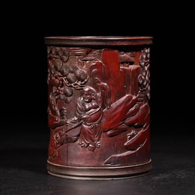 A Qing Dynasty bamboo carved bangs play golden toad pen holder