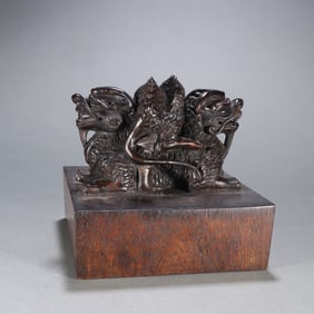 A Qing Dynasty agarwood dragon button seal