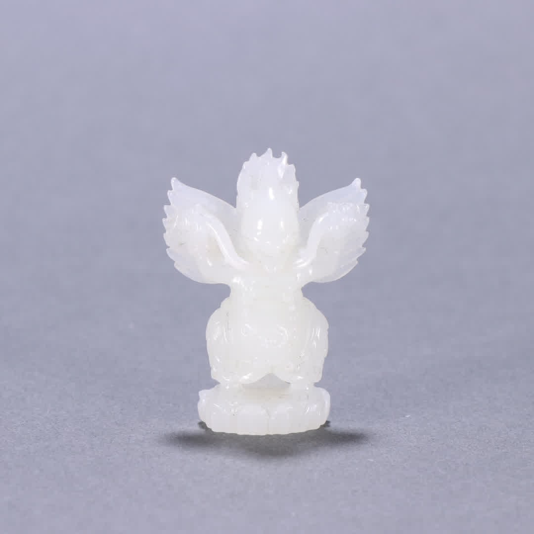 A Qing Dynasty Hetian jade roc bird carving (1 of 9)