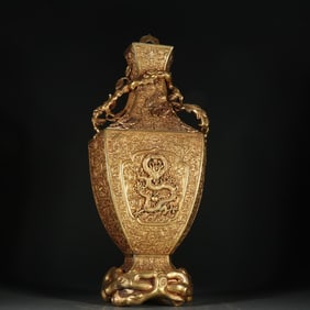 A Qing Dynasty copper gilt dragon pattern jade vase