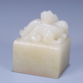 A Qing Dynasty Hetian jade dragon button poetry seal