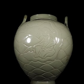 A Tang Dynasty Yue kiln secret color celadon high-relief figure lid jar
