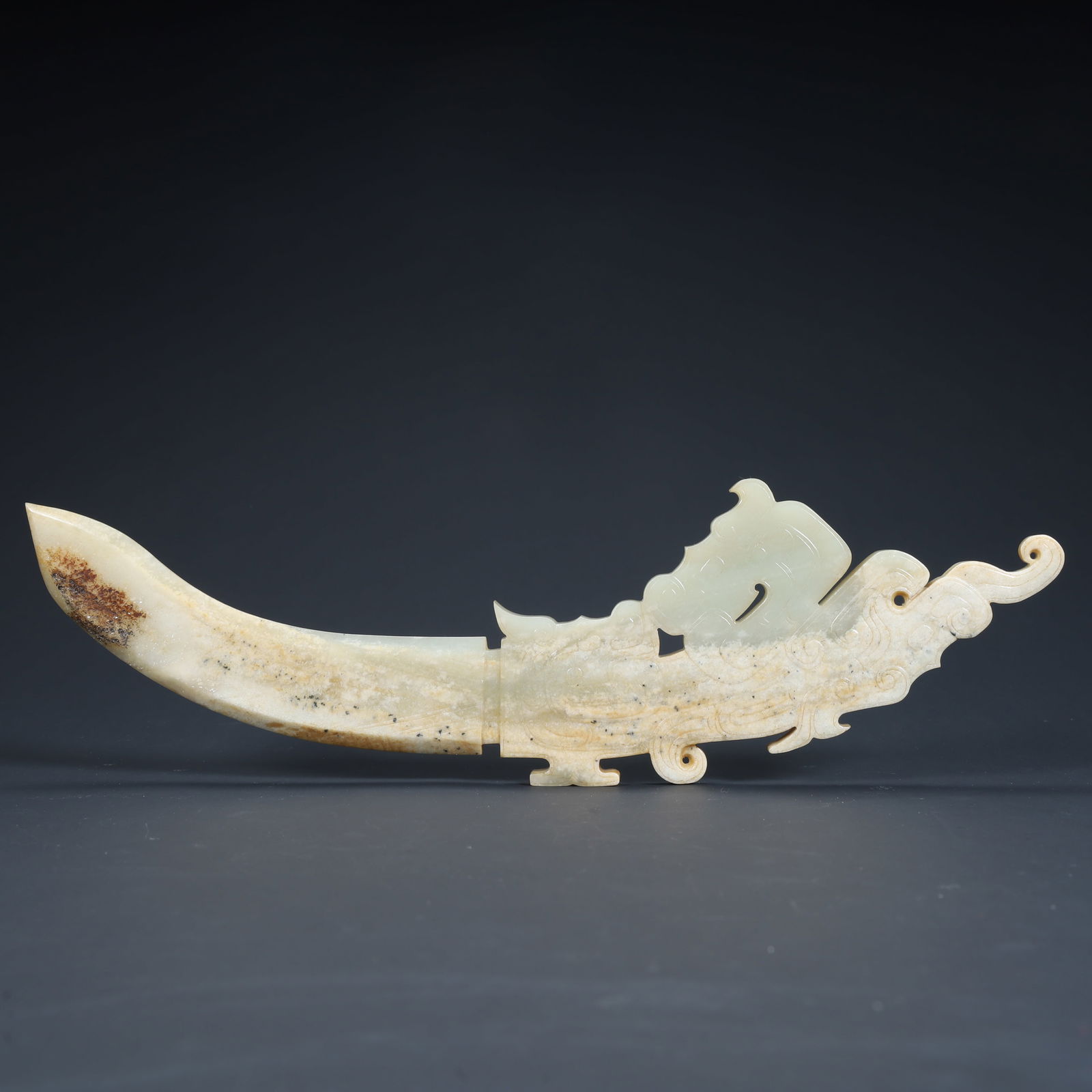A Qing Dynasty ancient jade knife-shaped ornament (1 of 12)