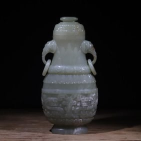 A Qing Dynasty beast-faced dragon elephant ear jade vase
