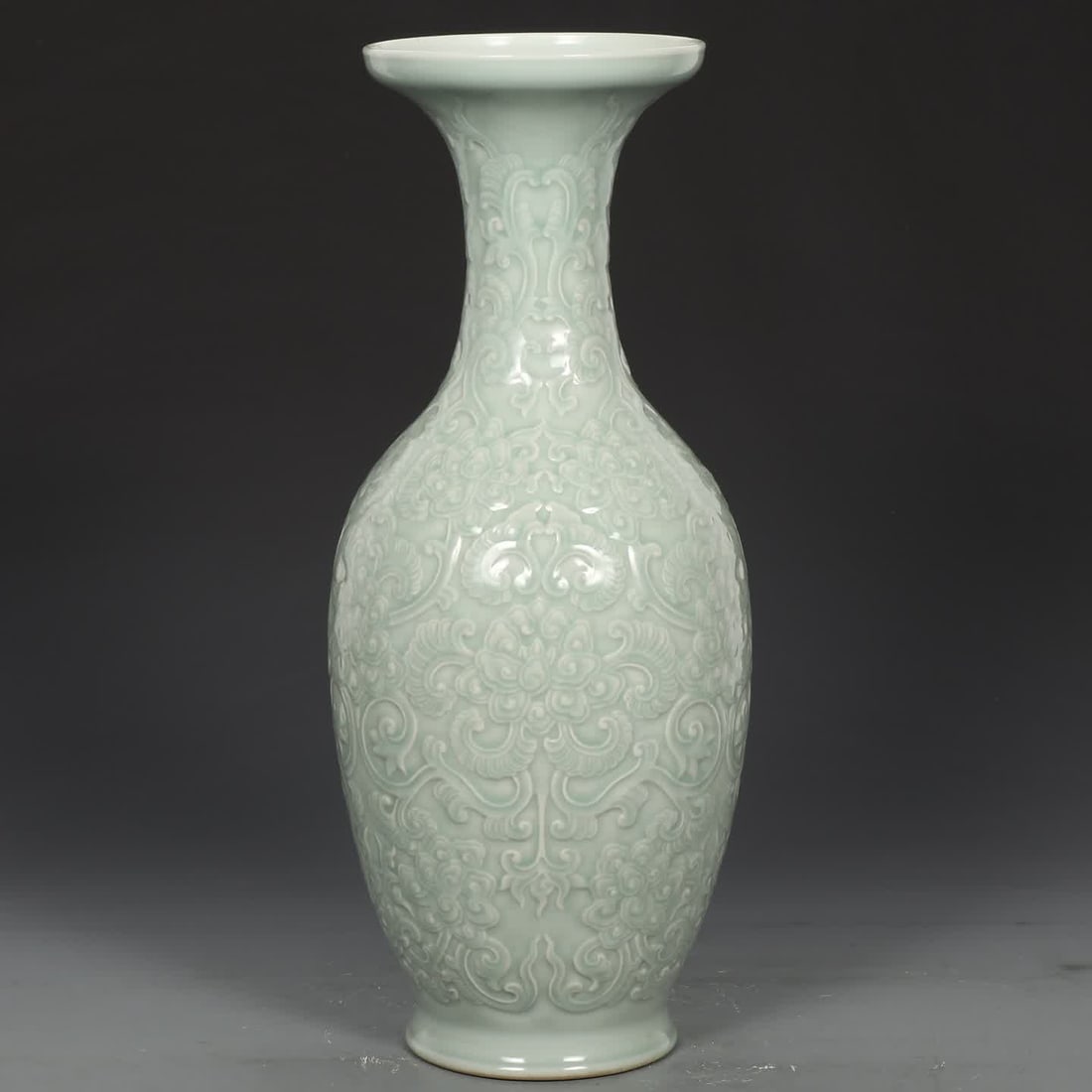 A Qing Qianlong bean celadon guipure entwined lotus pattern plate mouth bottle (1 of 8)