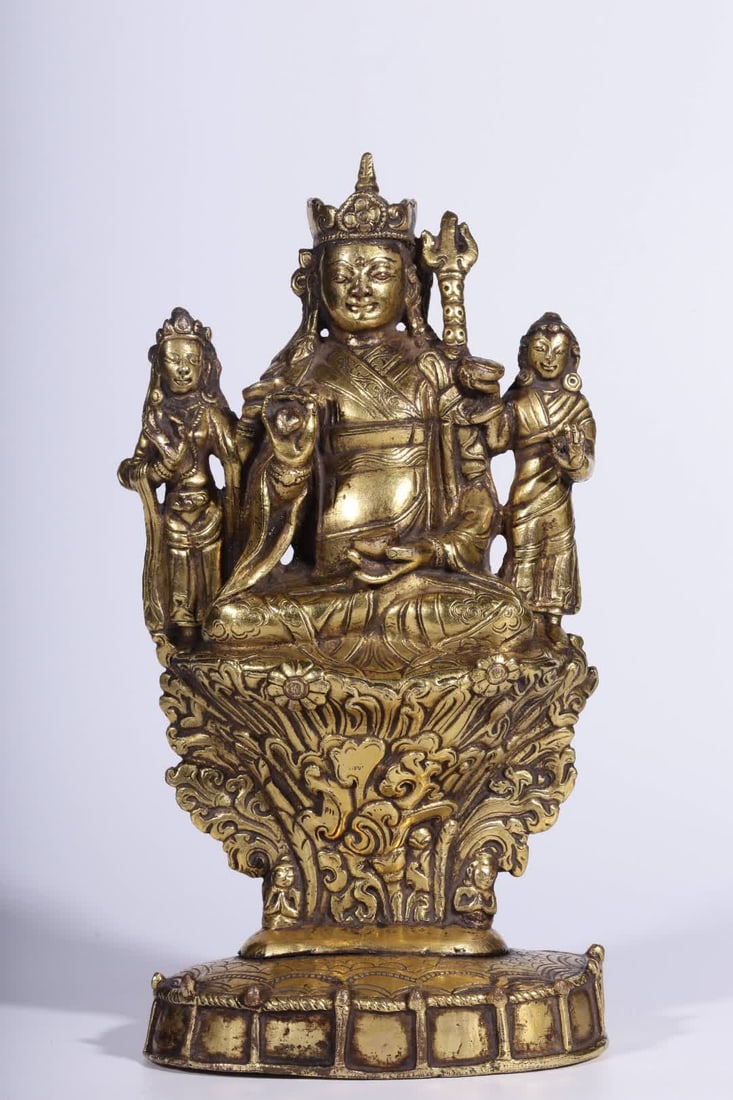A Qing Dynasty bronze gilt lotus master three statues (1 of 10)