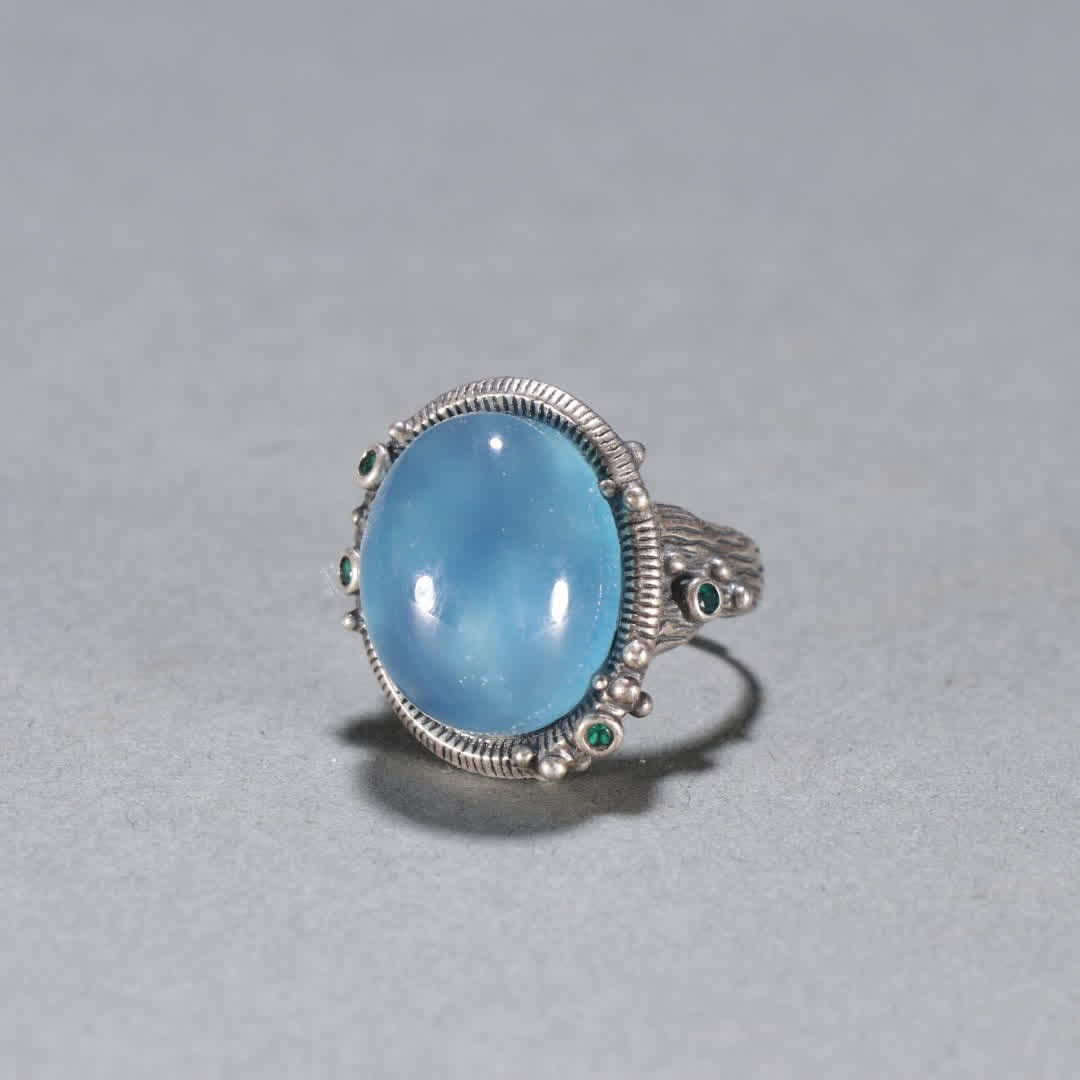A Qing Dynasty silver-inlaid aquamarine ring (1 of 9)