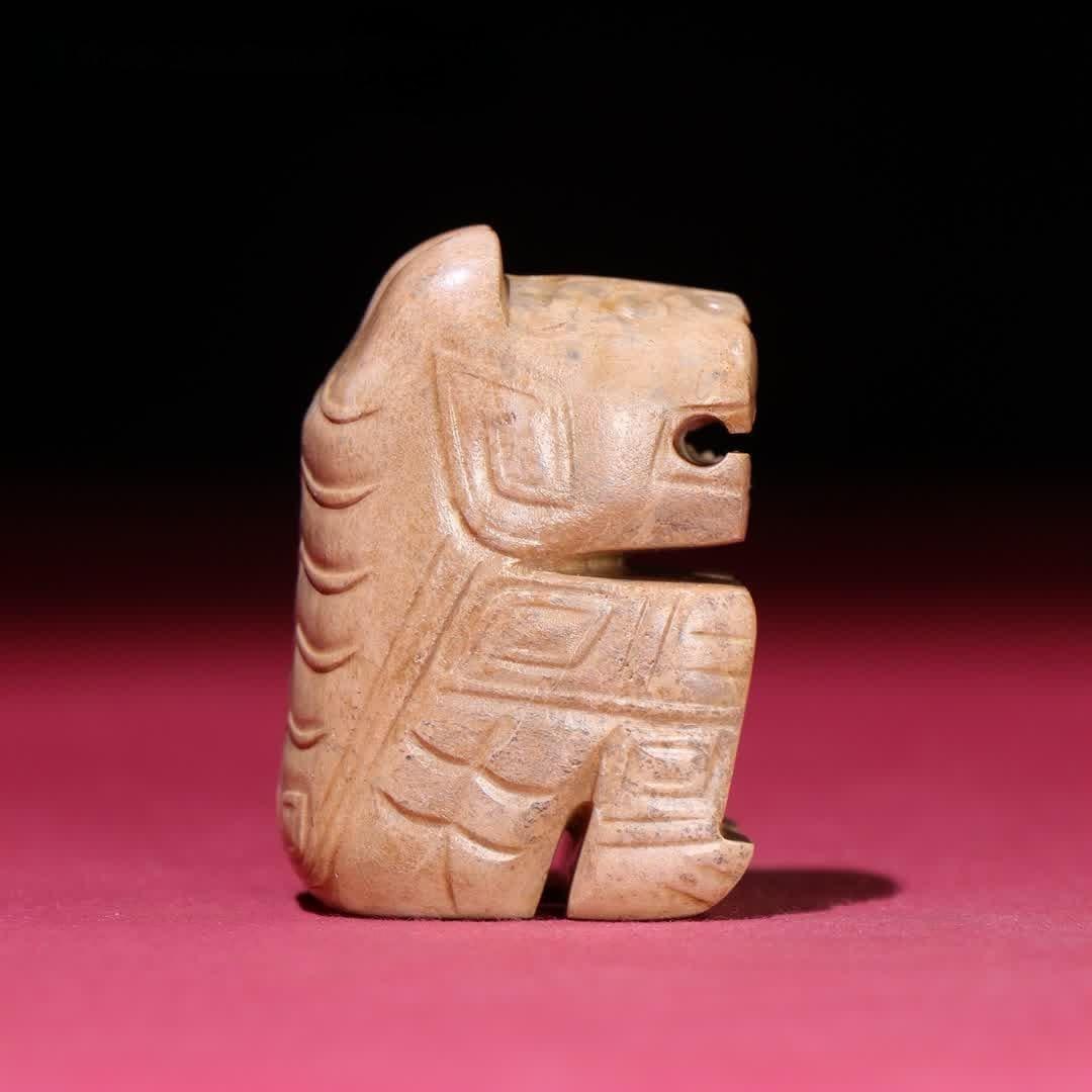 A Han Dynasty jade tiger handle (1 of 9)